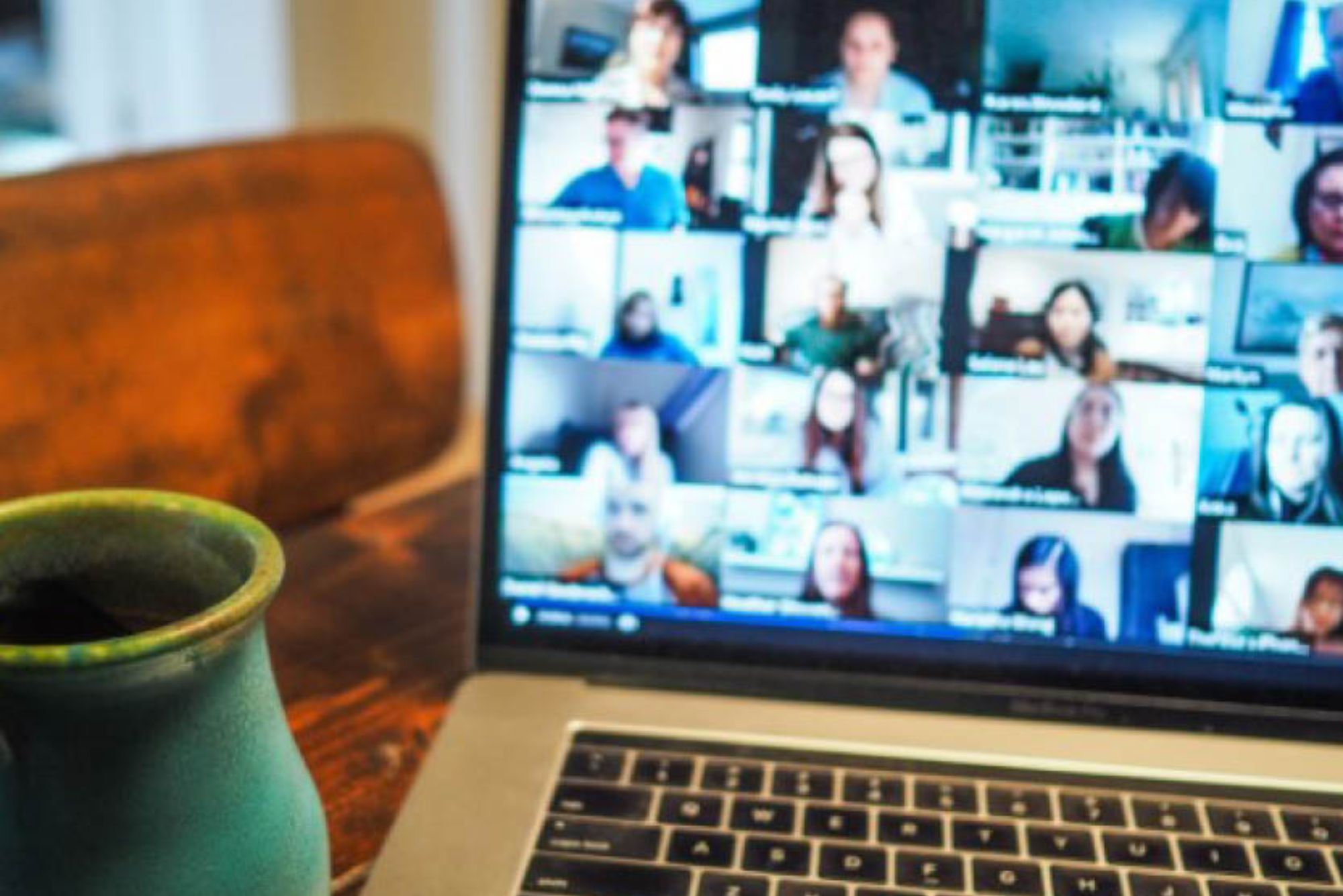A laptop set-up for a virtual meeting. 